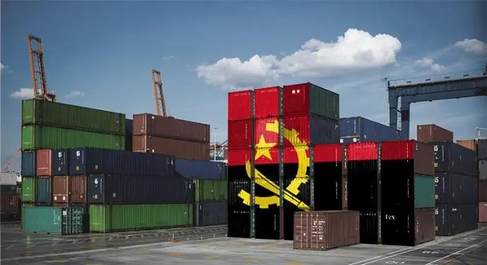 Image of a port with the flag of Angola painted over the containers.